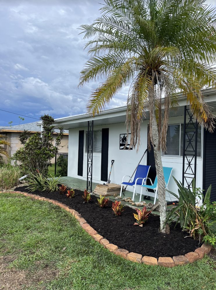 After — Bed makeover with fresh mulch in Port Charlotte, FL